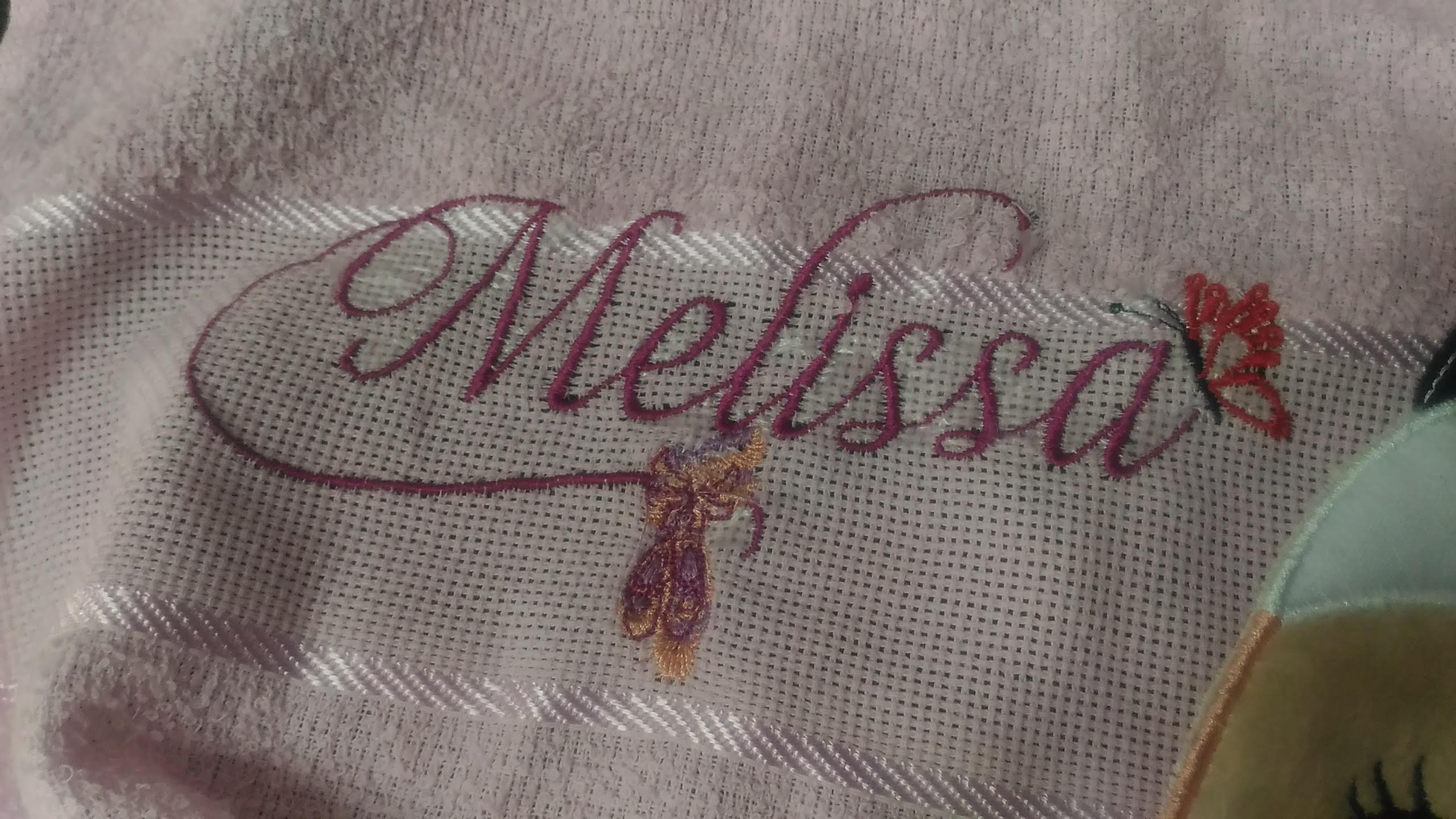 Toalha bordada — Melissa