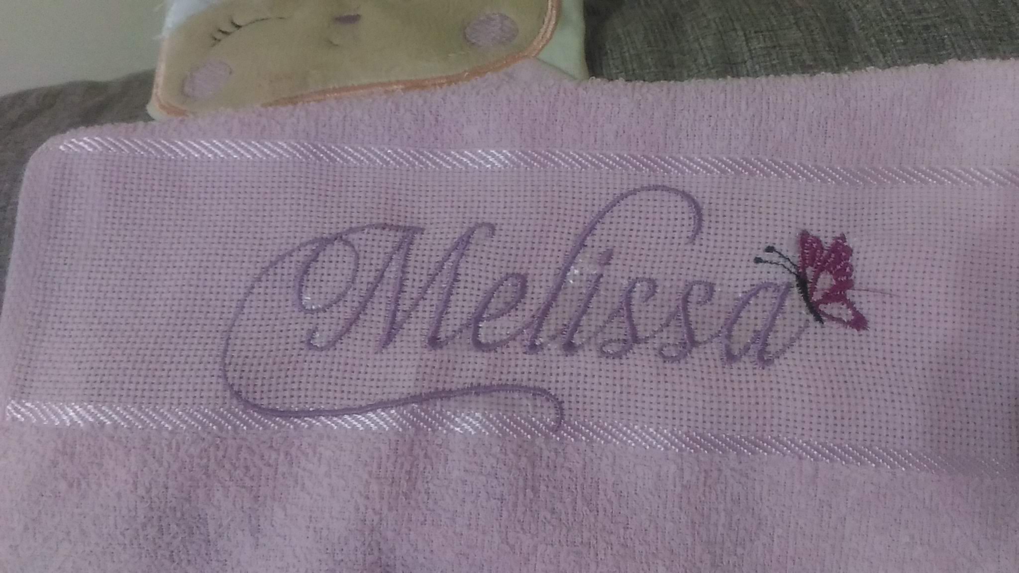 Toalha bordada — Melissa